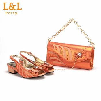 2024 Najnoviji stil INS Narančaste boje, elegantan niske štikle, popularan dizajn u Nigeriji, komplet afričkih ženske cipele i torbe